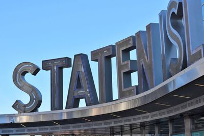 Low angle view of built structure against clear blue sky