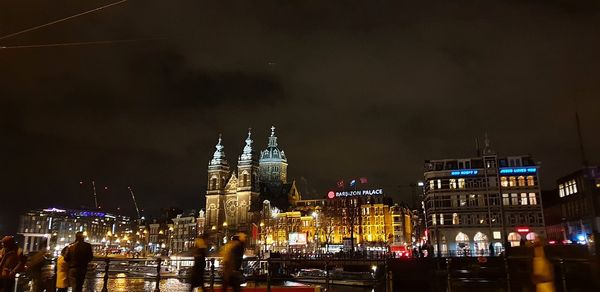 Illuminated buildings in city at night