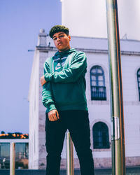 Portrait of young man standing outdoors