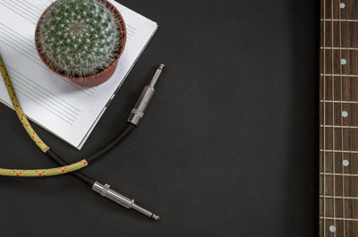 High angle view of pencil and book on table