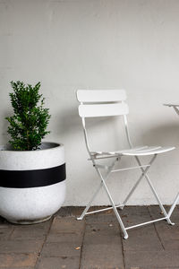 Chairs and table against wall at home