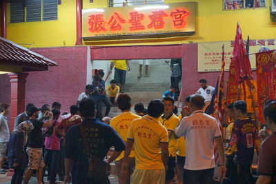 Group of people standing in front of building