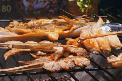 Close-up of meat on barbecue grill