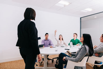 Group of people sitting in the table