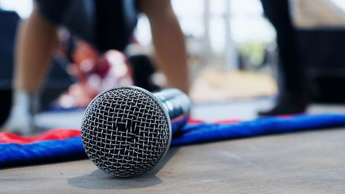 Close-up of microphone on stage