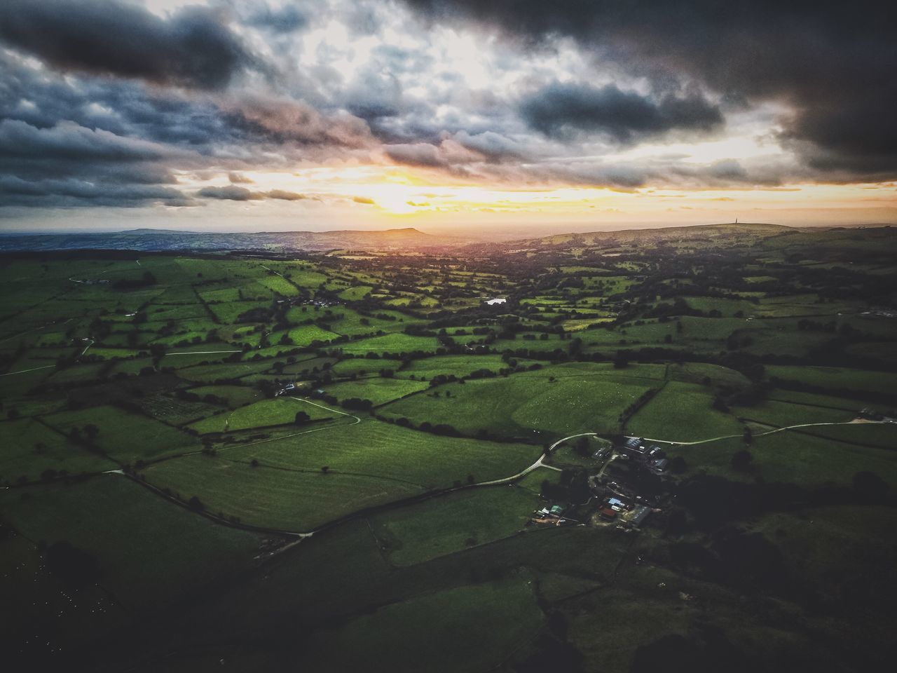 landscape, tranquil scene, tranquility, scenics, cloud - sky, beauty in nature, sky, nature, water, aerial view, rural scene, green color, non-urban scene, agriculture, cloud, calm, outdoors, farm, distant, the natural world, cloudy, solitude, green, majestic, sea, ocean, no people, horizon over land