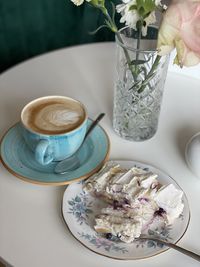 High angle view of coffee cup on table