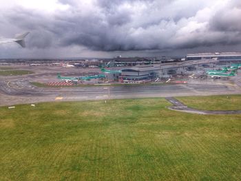 Scenic view of landscape against cloudy sky