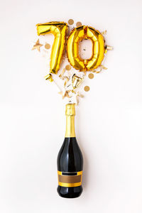 Close-up of christmas decorations on white background