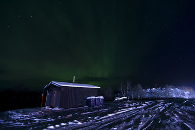 Low angle view of building against sky at night