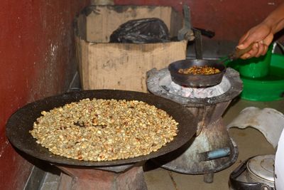 Midsection of person preparing food on table