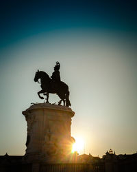 Low angle view of statue against sky