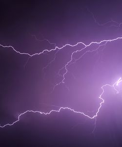 Low angle view of lightning at night