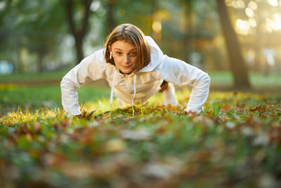 Full length of woman on field