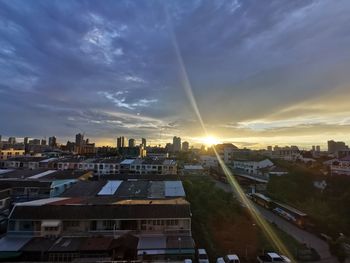 High angle view of buildings against sky during sunset