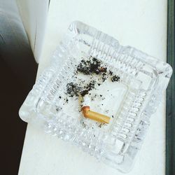 Cigarette butt in ashtray