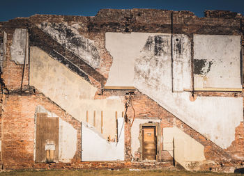 Built structure against white wall