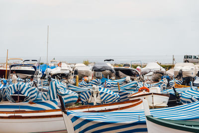 Boats moored at harbor