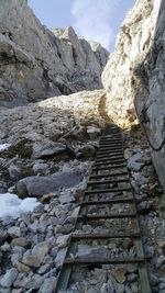 Low angle view of steps leading towards mountain