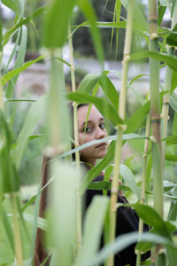 Portrait of young woman in grass
