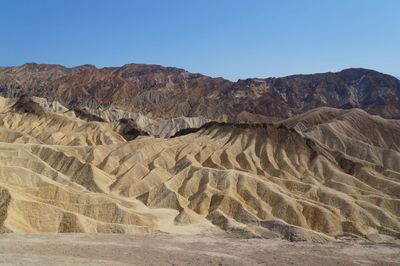 Scenic view of rocky mountains against sky, zabriskie point, death valley