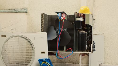 High angle view of equipment on wall