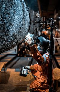 Cropped image of man working at workshop