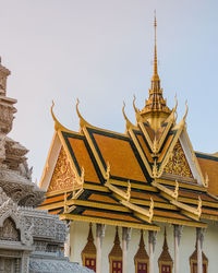 Low angle view of temple building against clear sky