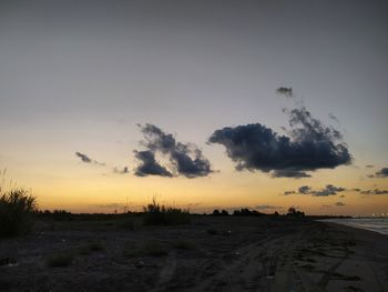 Scenic view of silhouette landscape against sky during sunset