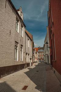 Empty street with brick buildings at bruges. a town full of canals in belgium.