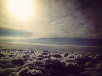 Scenic view of landscape against cloudy sky