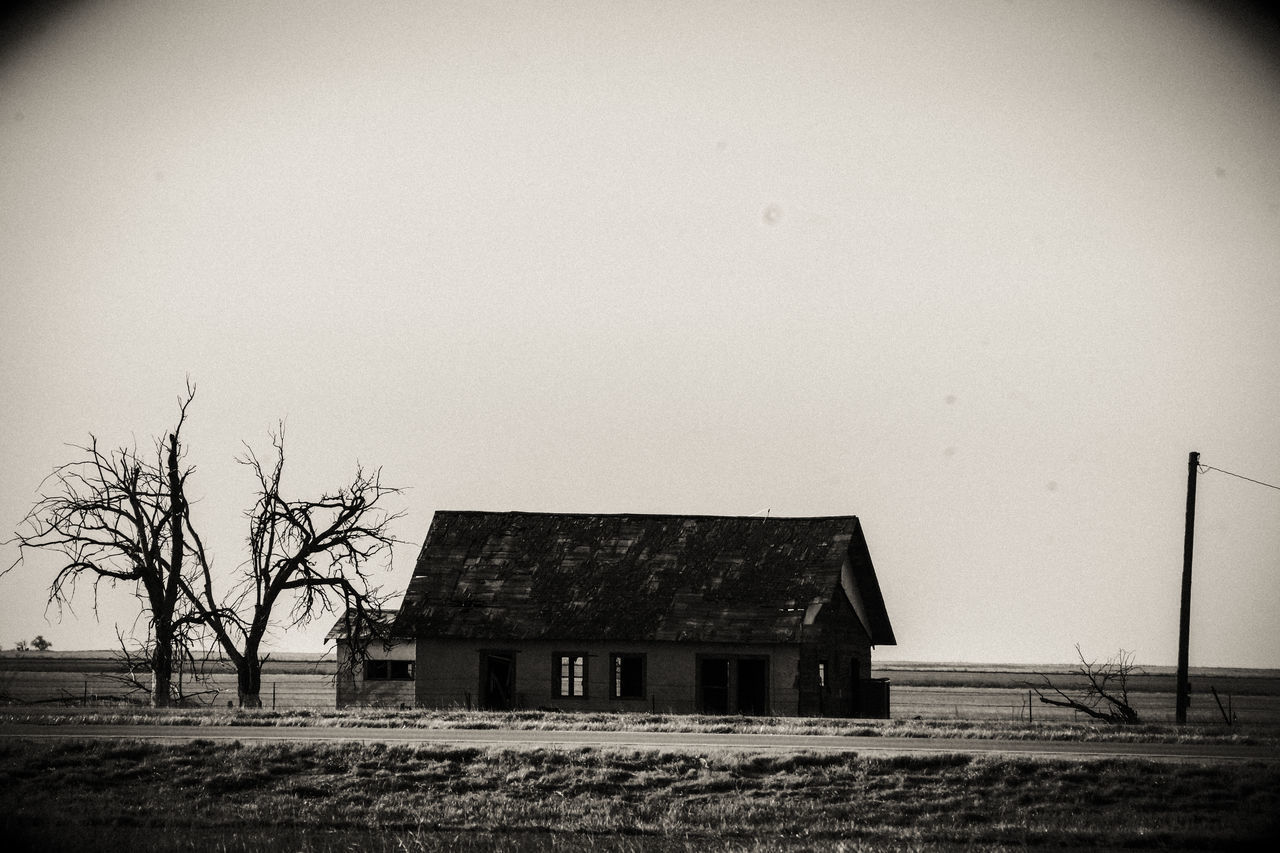 ABANDONED HOUSE AGAINST CLEAR SKY