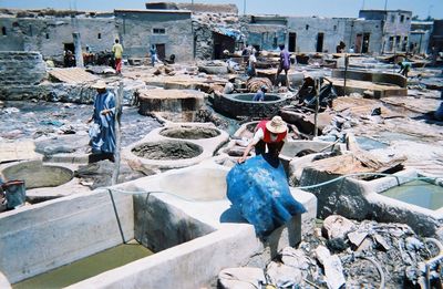 Workers working at construction site in village