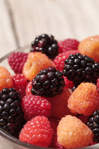 Close-up of raspberries in bowl on table