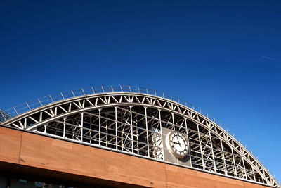 Low angle view of building against blue sky