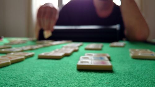 Close-up of hands on table