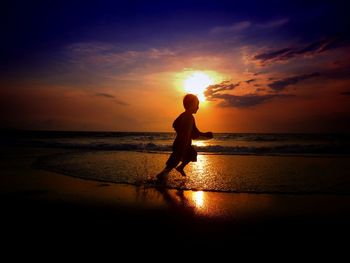 Scenic view of sea at sunset