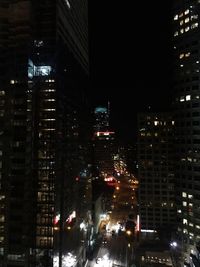Illuminated cityscape at night