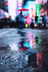 Surface level of wet road in city