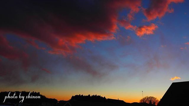 sunset, silhouette, sky, cloud - sky, low angle view, building exterior, built structure, beauty in nature, architecture, scenics, orange color, nature, cloud, dramatic sky, cloudy, dusk, tranquility, tranquil scene, house, outdoors