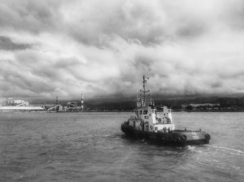 Ship in sea against sky