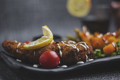 Close-up of food served on table