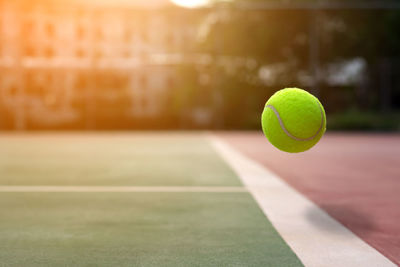 Ball in mid-air at tennis court