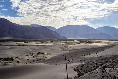 Scenic view of desert against sky