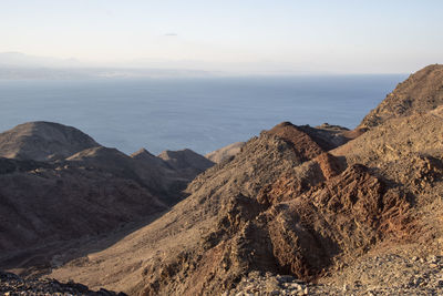 Arid desert mountains against the backdrop of the red sea. shlomo mountain, eilat israel