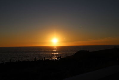 Scenic view of sunset over sea