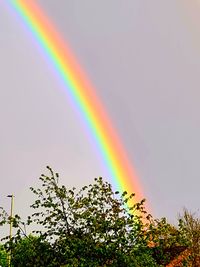 Low angle view of rainbow against sky