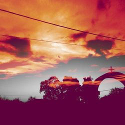 Low angle view of cloudy sky at sunset