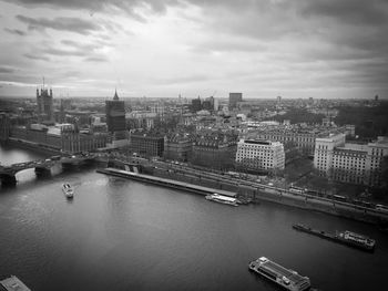 High angle view of river amidst buildings in city
