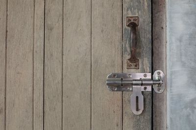 Close-up of latch on door